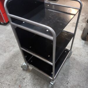 Trolley op 4 zwenkwielen met zwart nylon werkblad en 2 schappen